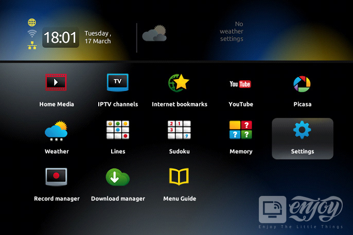 MAG set-top box main portal screen showing the Home Media, IPTV channels, Internet bookmarks and Settings tiles